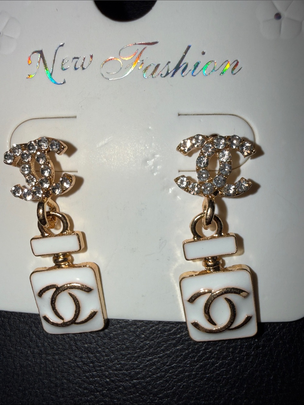 Gold and White Crystal Logo Drop Earrings